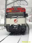 Tren de cercanias en la nevada estación de Cercedilla